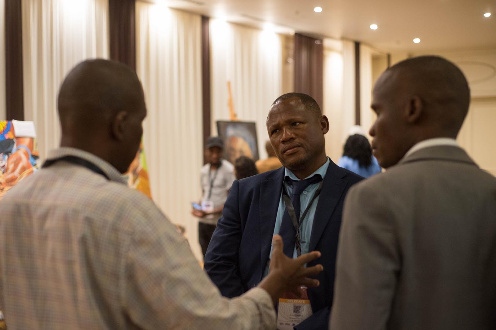 Delegates in conversation during a Forum networking break