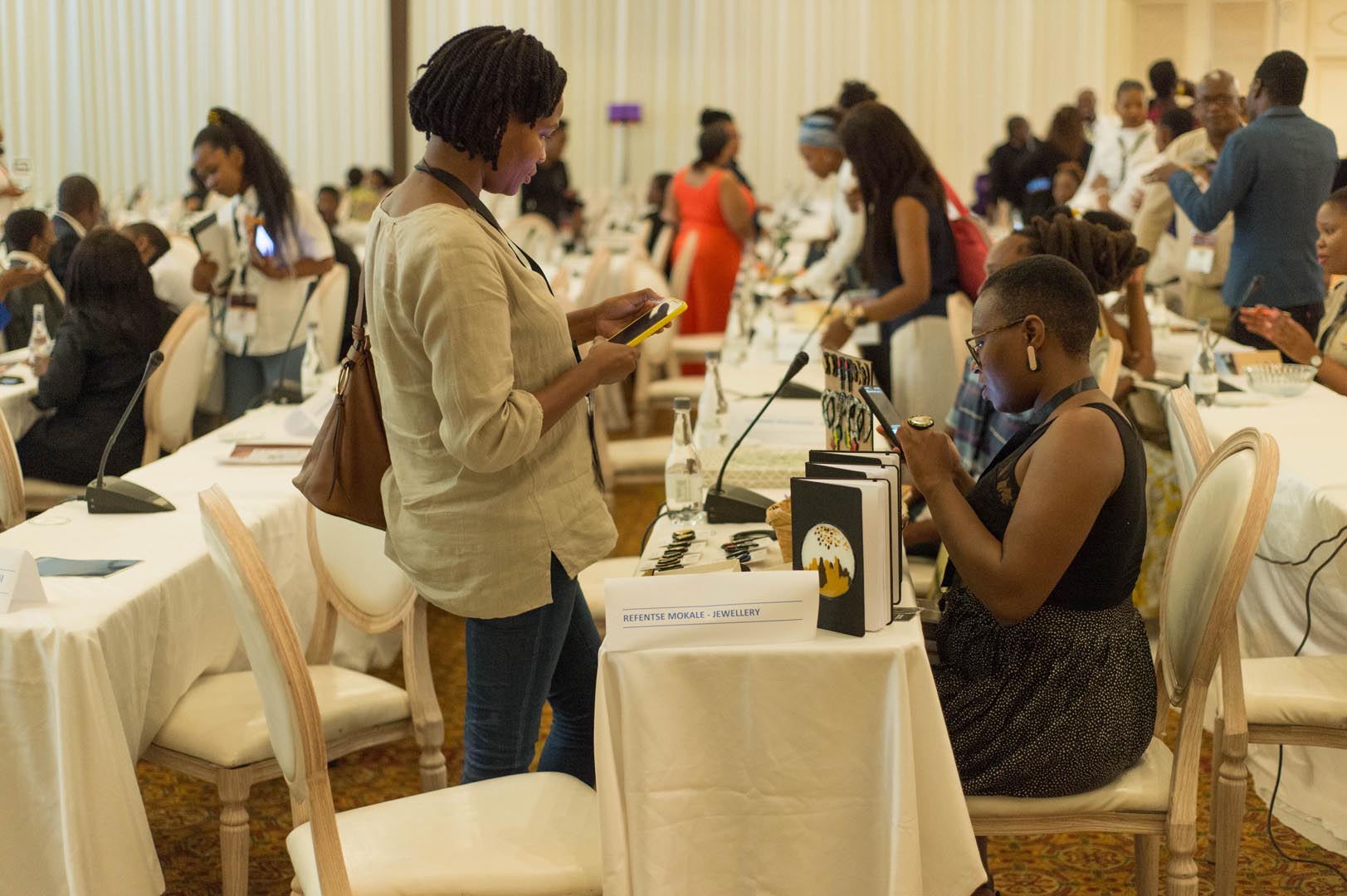 Delegates browsing exhibitor tables at the Africa Tourism Leadership Forum